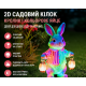 Садовий декор у формі кролика з кольоровим яйцем